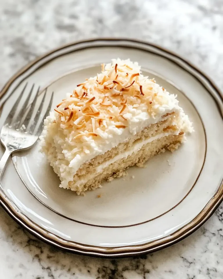 Heavenly Layers: Indulge in the Dreamy Coconut Cloud Cake - Featured Image