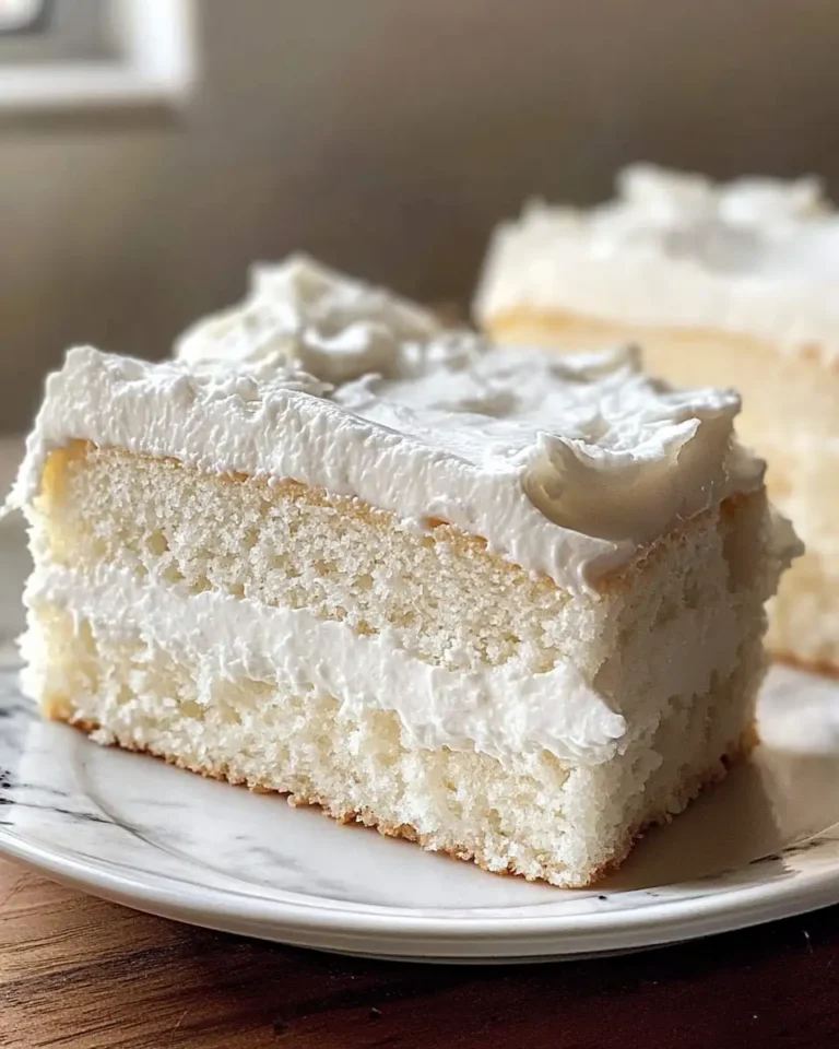 Indulge in Sweet Bliss with Our Heavenly White Snack Cake - Featured Image