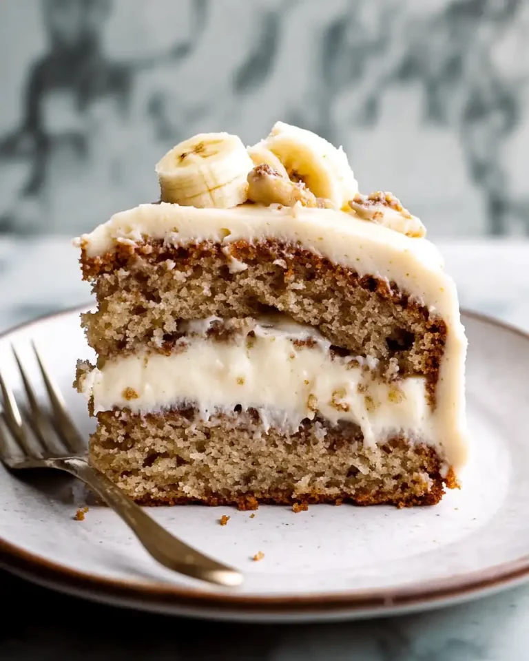 Irresistible Banana Cake Bliss with Cream Cheese Icing Delight - Featured Image
