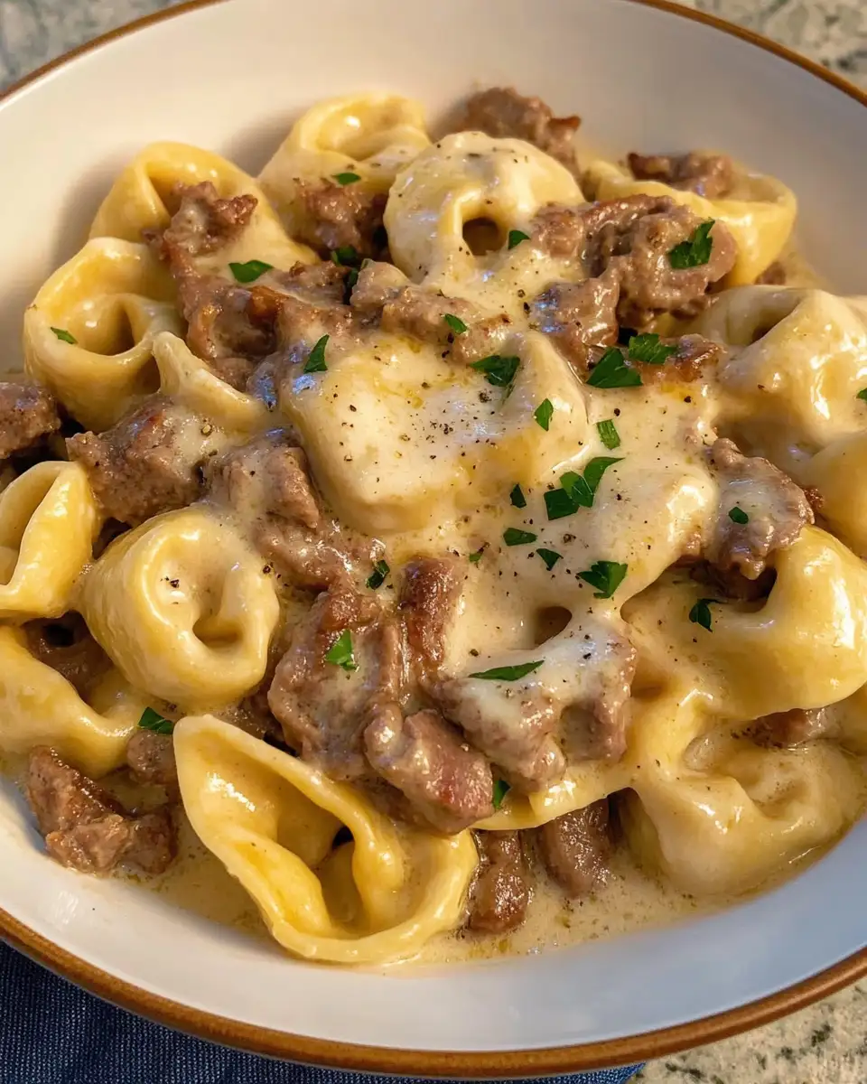 Indulge in Cheesesteak Tortellini Drenched in Creamy Provolone Bliss - Featured Image