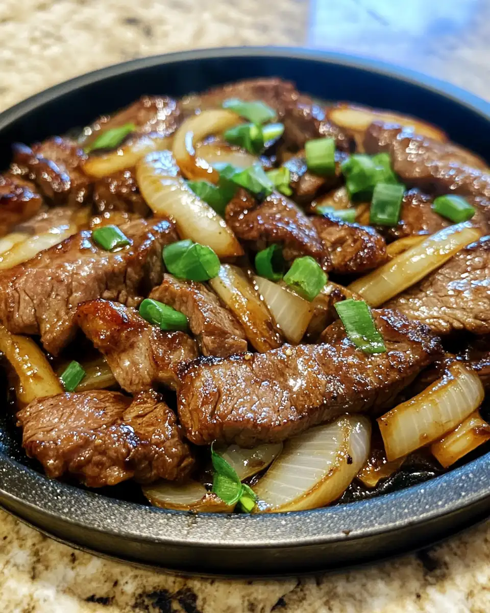 Sizzling Chinese Pepper Steak with Onions That Will Ignite Your Taste Buds 6 Final dish - Sizzling Chinese Pepper Steak with Onions That Will Ignite Your Taste Buds