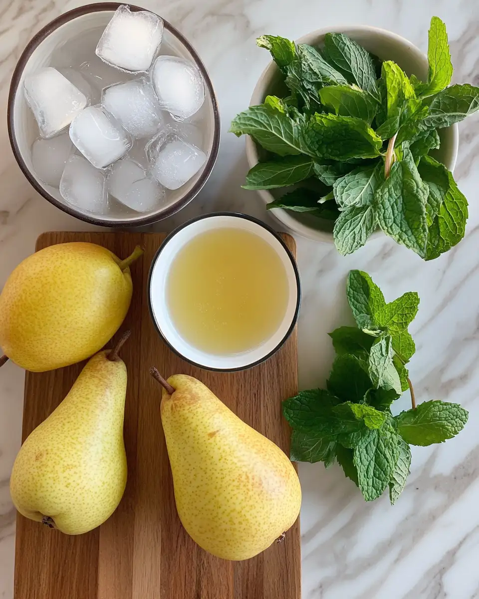 Refreshing Elegance: Vanilla Pear Sparkler Mocktails by Spoonful of Plants 4 Ingredients for Refreshing Elegance: Vanilla Pear Sparkler Mocktails by Spoonful of Plants