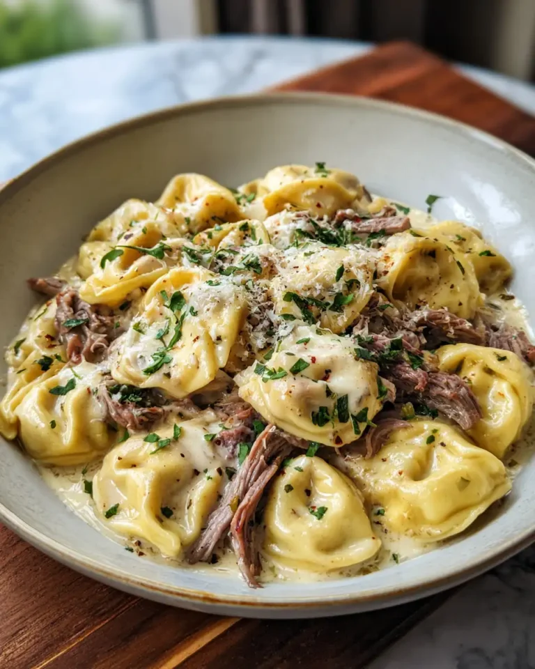 Indulge in the Ultimate Creamy Cheesesteak Tortellini with Provolone Sauce - Featured Image