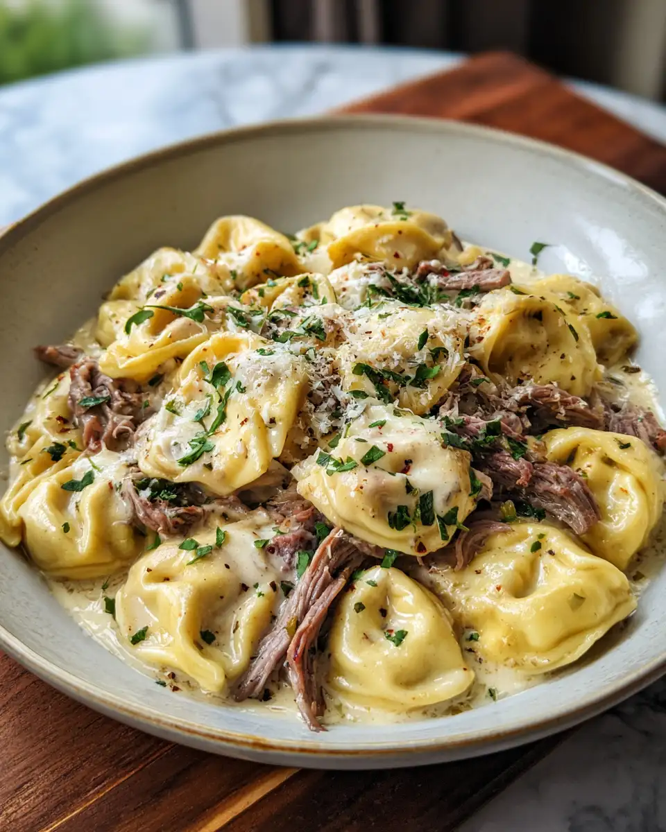 Indulge in the Ultimate Creamy Cheesesteak Tortellini with Provolone Sauce - Featured Image