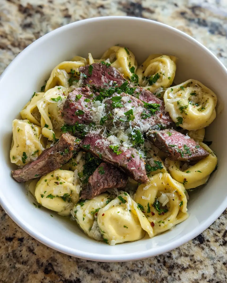 Sizzling Garlic Butter Steak Tortellini: A Flavorful Italian Indulgence 4 Ingredients for Sizzling Garlic Butter Steak Tortellini: A Flavorful Italian Indulgence